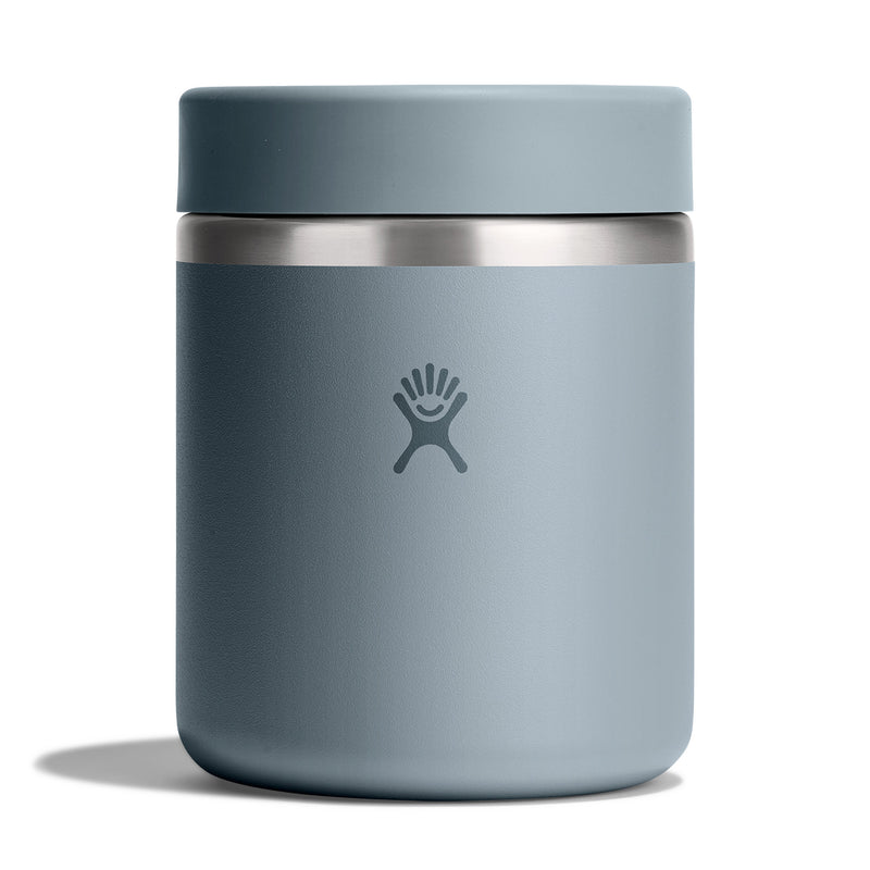 Blue thermos with a silver lid on a white background