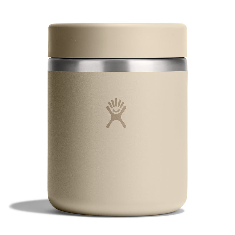 Beige thermos with silver lid on a white background
