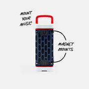 Portable speaker with magnet mounts on a white background