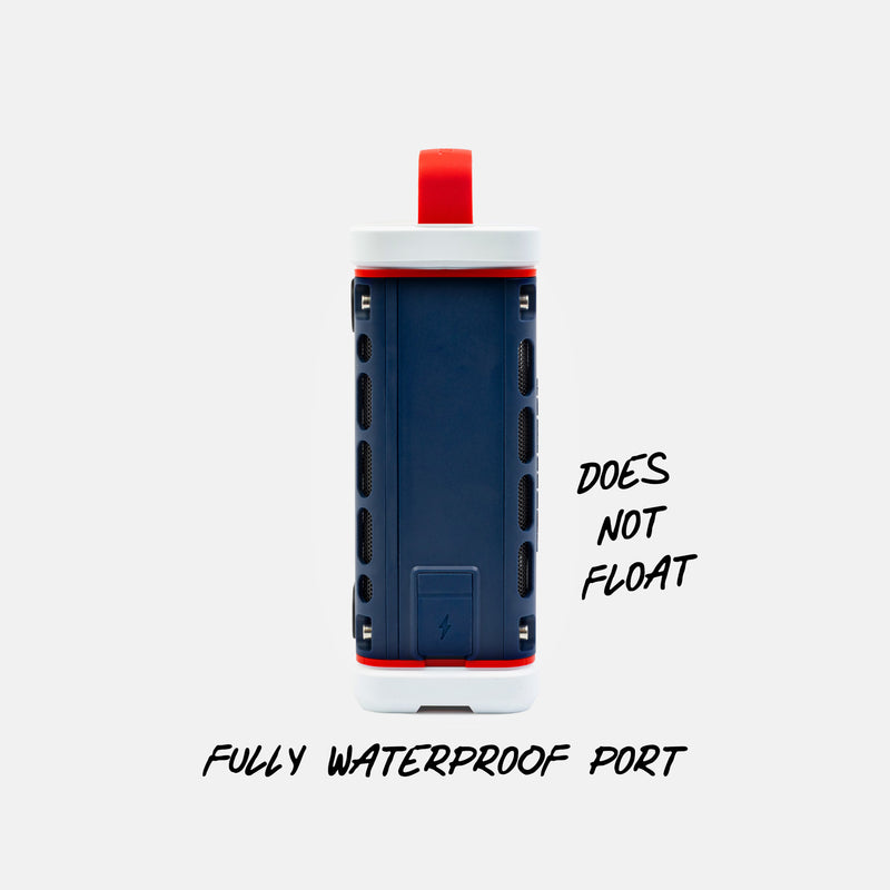 Blue and red waterproof portable speaker with text indicating it does not float