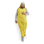 Person wearing a yellow sleeping bag liner with a hood on a white background