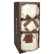 Product packaging with soft faux fur item and Ariat branding, featuring color swatches and text about product features.