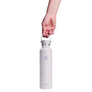 White water bottle with a hand holding it on a white background