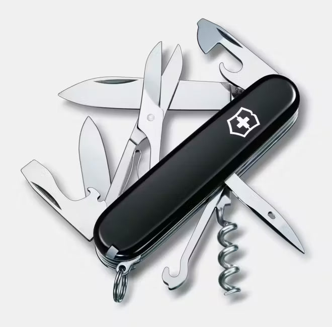 Multitool with various tools on a white background