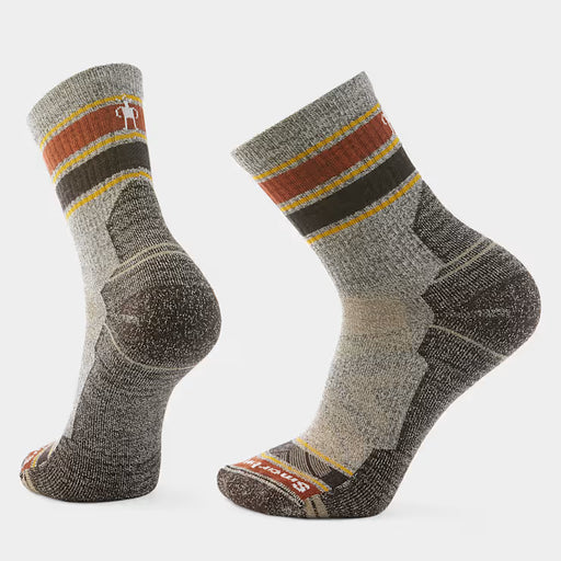 Pair of grey and red socks on a white background.