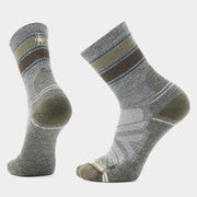 Pair of grey and green socks on a white background.