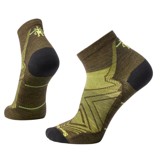 Pair of brown and green patterned socks on a white background
