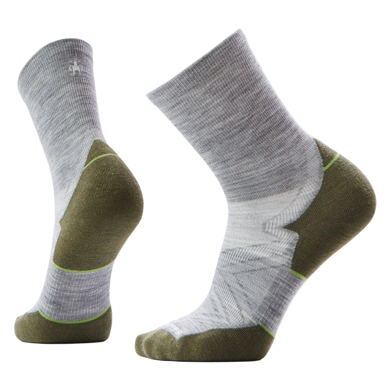 Gray and green socks on a white background