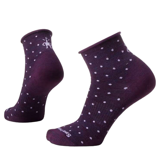 Pair of purple socks with white polka dots on a white background