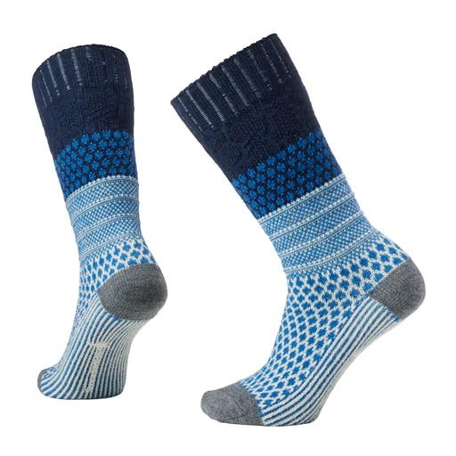 Pair of blue and gray patterned socks on a light gray background