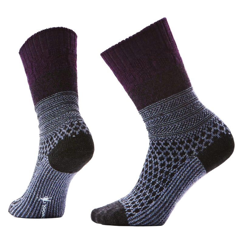 Pair of purple and gray patterned socks on a white background
