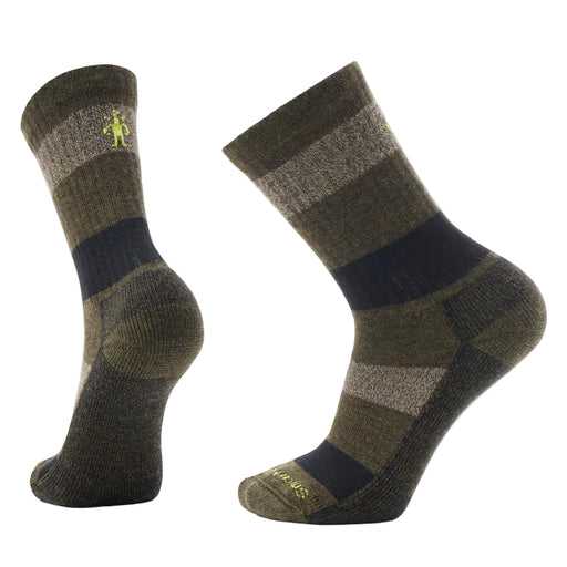 Pair of green and brown striped socks on a light gray background