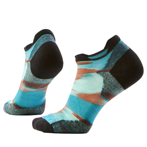 Pair of striped socks with black, blue, and brown colors on a light gray background
