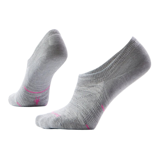 Pair of gray socks with pink accents on a light gray background