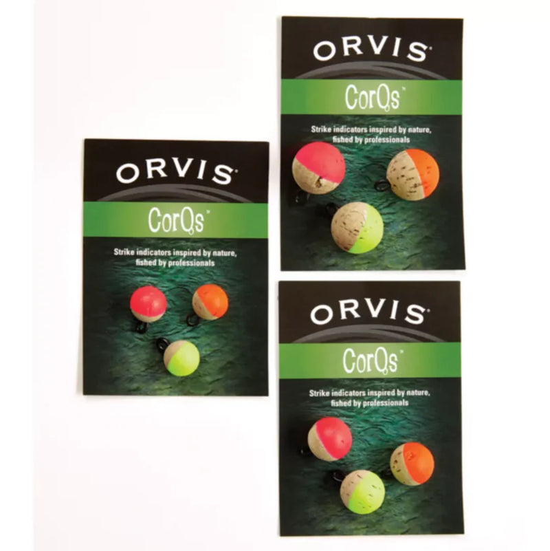 Three packages of multicolored strike indicators against a white background. 