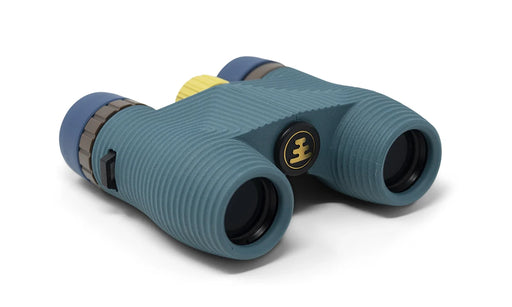 A blue pair of binoculars with a yellow dial on a white background