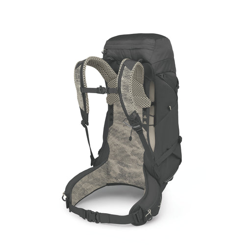 A black hiking backpack shown from the rear three-quarter view, featuring a black outer shell, gray mesh back panel, and padded shoulder straps with a subtle pattern.