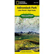 National Geographic Trails Illustrated topographic map cover for Adirondack Park, Lake Placid / High Peaks, New York. The cover features a yellow header with black text, a green National Geographic logo banner, and a scenic landscape photo of mountains and autumn foliage below.