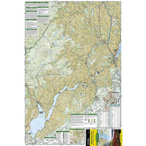 A detailed topographic map poster of New York State's Adirondack Park in the Lake George/Great Sacandaga areas, featuring tan terrain, water bodies, roads, and informational panels along the borders, including a National Geographic Backcountry Pack section.