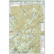 A detailed topographical map of Adirondack Park, featuring shaded relief terrain, waterways, roads, and informational panels.