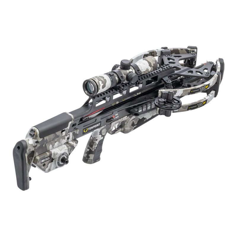 A crossbow with a gray and white digital camouflage pattern, featuring a mounted scope and black mechanical components, shown on a solid white background.