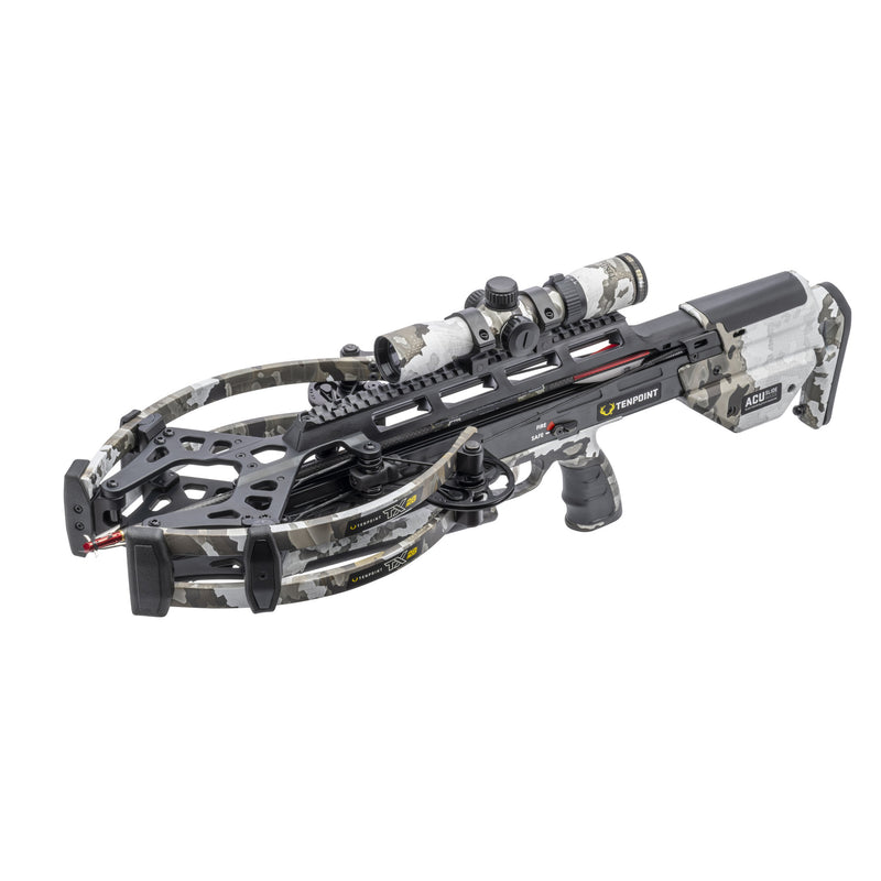 A crossbow with a black metal stock and barrel, featuring a camouflage-patterned riser and limbs, equipped with a mounted scope and a visible optic, shown on a solid white background.