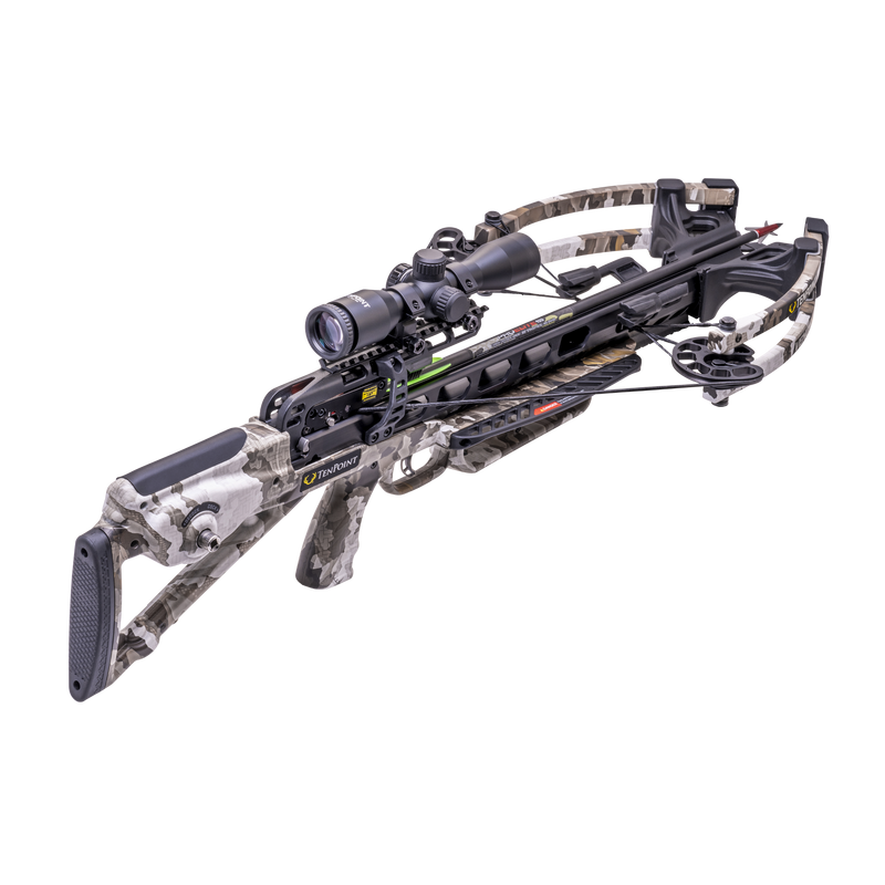 A crossbow with a camouflage stock and limbs, equipped with a mounted scope and sight, shown against a solid white background.