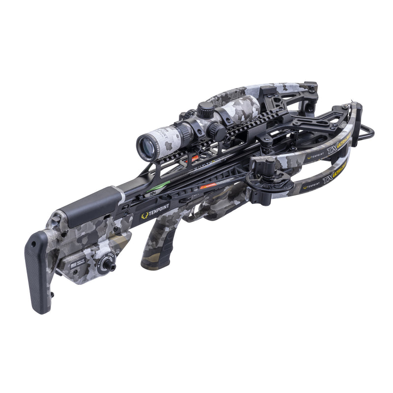 A black and gray camouflage crossbow with an attached scope, shown on a solid white background.