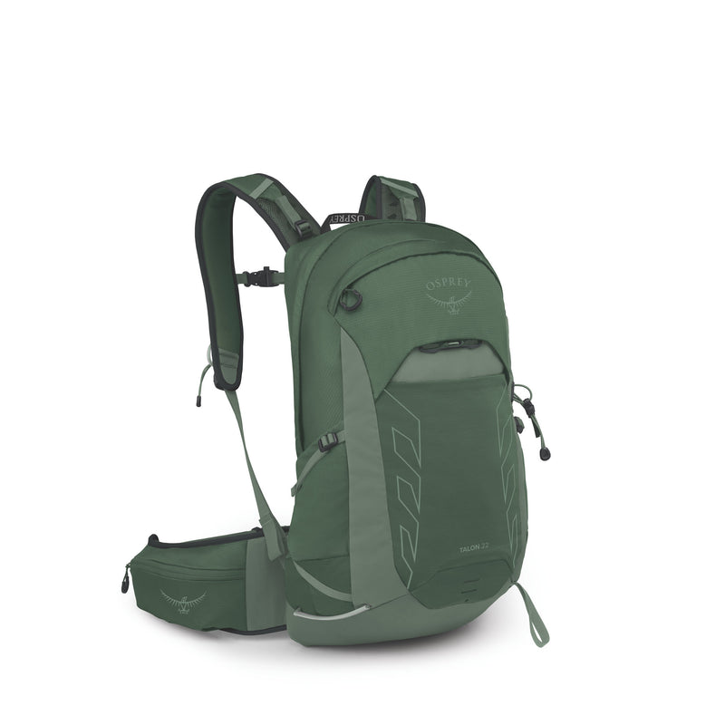 An Osprey backpack in a muted sage green color, shown from a three-quarter rear angle with its matching side pouch extended. The backpack features gray accents, padded shoulder straps, and the Osprey logo on the front and side pouch.