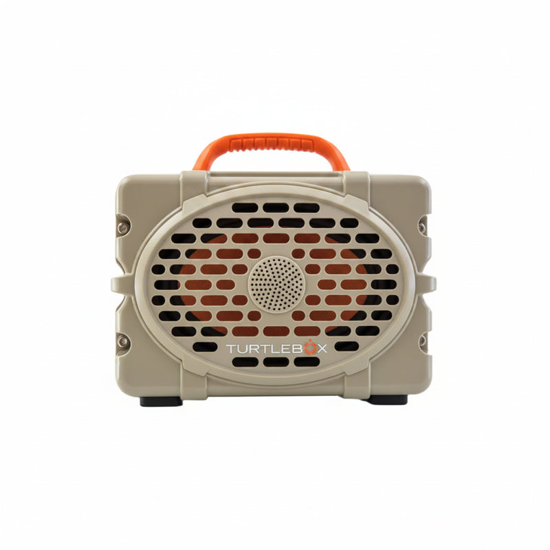 A tan Turtlebox Original Gen 3 Speaker with a tan speaker grill and an orange handle on top.