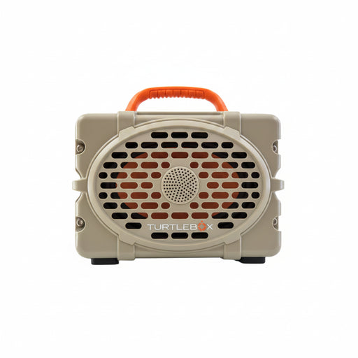 A tan Turtlebox Original Gen 3 Speaker with a tan speaker grill and an orange handle on top.