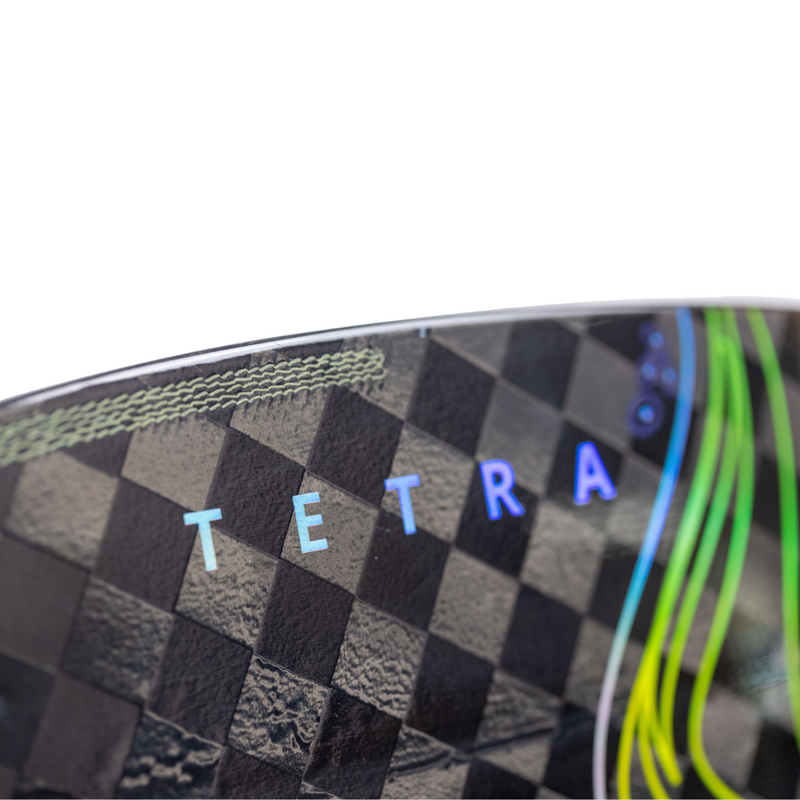 Close up of a black and grey paddle with green accents and a visible Tetra logo on a white background.
