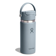 A Hydro Flask insulated water bottle in a muted slate blue-gray color, featuring a matching lid with a carry loop and a stainless steel band near the top.