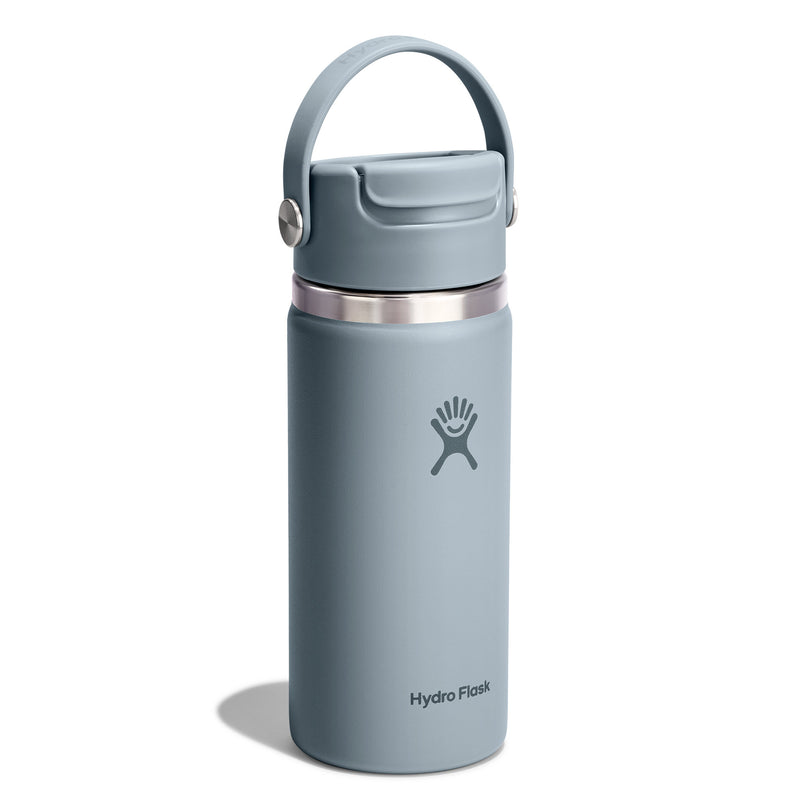 A Hydro Flask insulated water bottle in a muted slate blue-gray color, featuring a matching lid with a carry loop and a stainless steel band near the top.