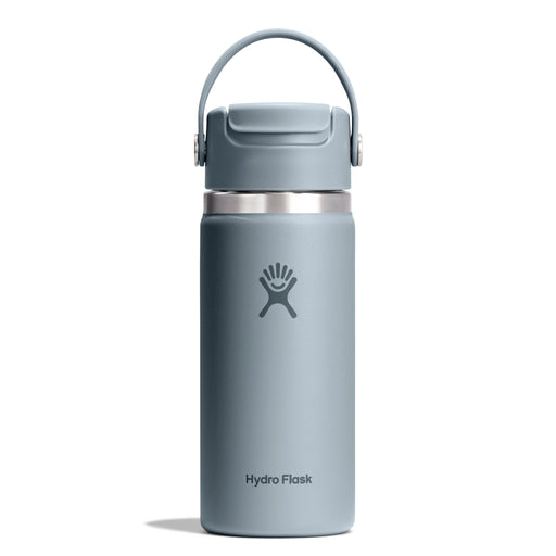 A Hydro Flask insulated water bottle in a muted slate blue-gray color, featuring a matching gray lid with a carrying loop and a silver stainless steel collar, shown on a clean white background.