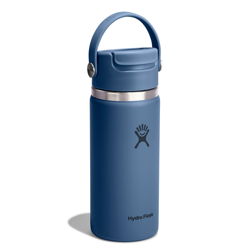 A blue Hydro Flask insulated water bottle with a matching blue lid and carry loop, featuring a silver stainless steel band and the Hydro Flask logo, shown on a white background.
