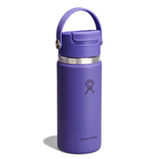 A purple Hydro Flask insulated water bottle with a matching purple lid and carry loop, featuring a silver stainless steel band and the Hydro Flask logo, set against a plain white background.