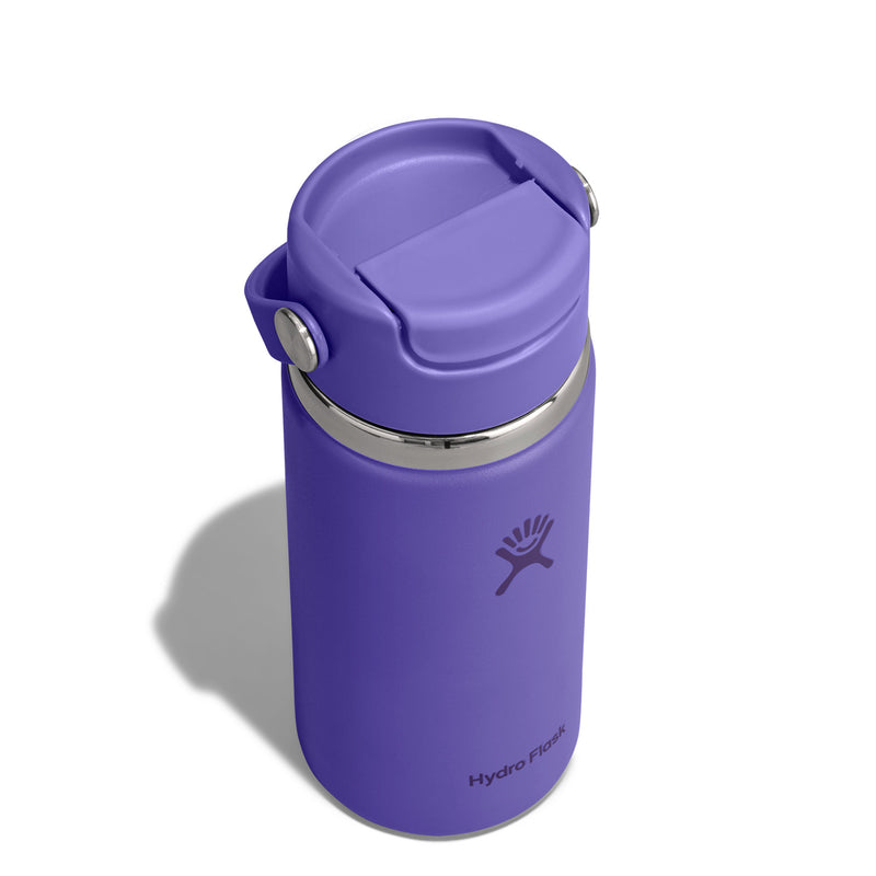 A purple Hydro Flask insulated tumbler with a flip-top lid, shown on a white background with a soft shadow.
