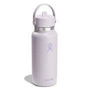 A Hydro Flask insulated water bottle in a pale lavender color, featuring a matching lavender lid with a carry loop and a silver stainless steel collar, set against a plain white background.