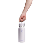 White water bottle with a handle held by a hand on a white background