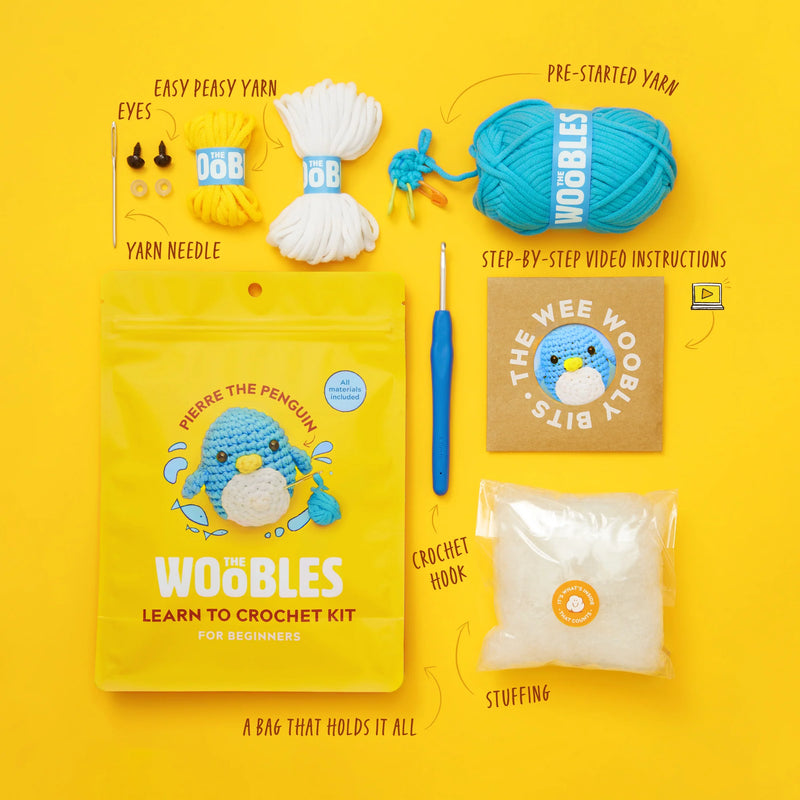 Crochet kit with yarn, needle, hook, and instructions on a yellow background