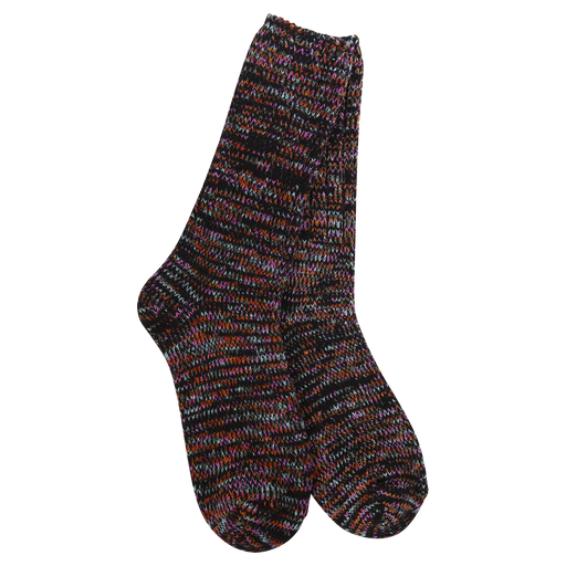 Pair of black and multicolor socks against a white ackground.