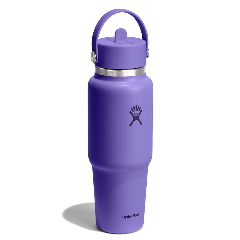 A purple Hydro Flask insulated water bottle with a matching purple lid and carrying loop, featuring a silver metal band and the Hydro Flask logo, set against a plain white background.