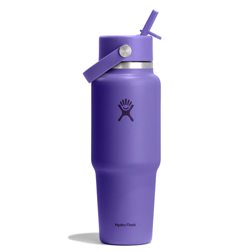 A purple Hydro Flask insulated water bottle with a matching purple lid and straw, featuring the Hydro Flask logo on the front, set against a plain white background.