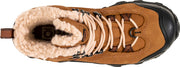 Top view of a brown shoe with black accents and white fur trim against a white background. 