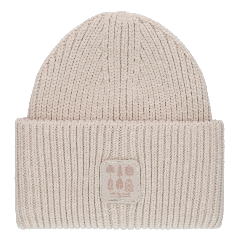 White knit beanie against a white background. 