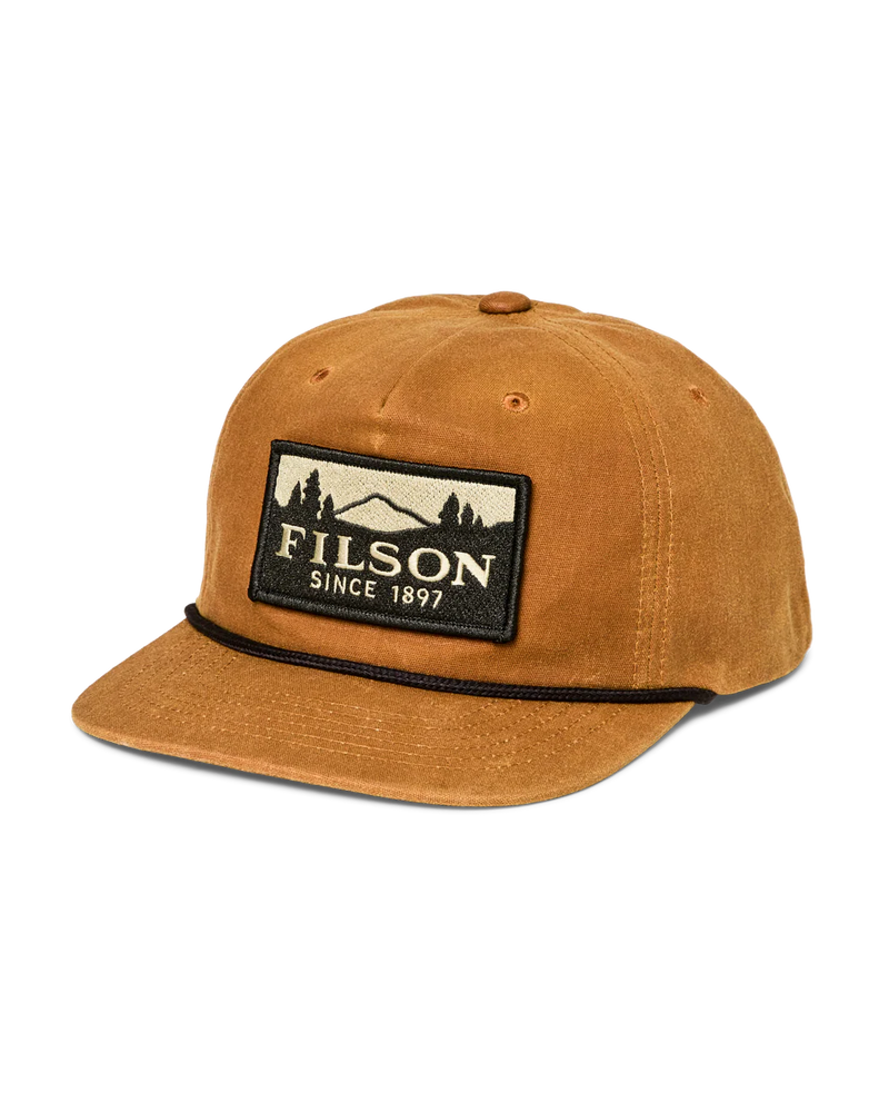 Front view of a light brown trucker cap with a Filson logo against a white background. 