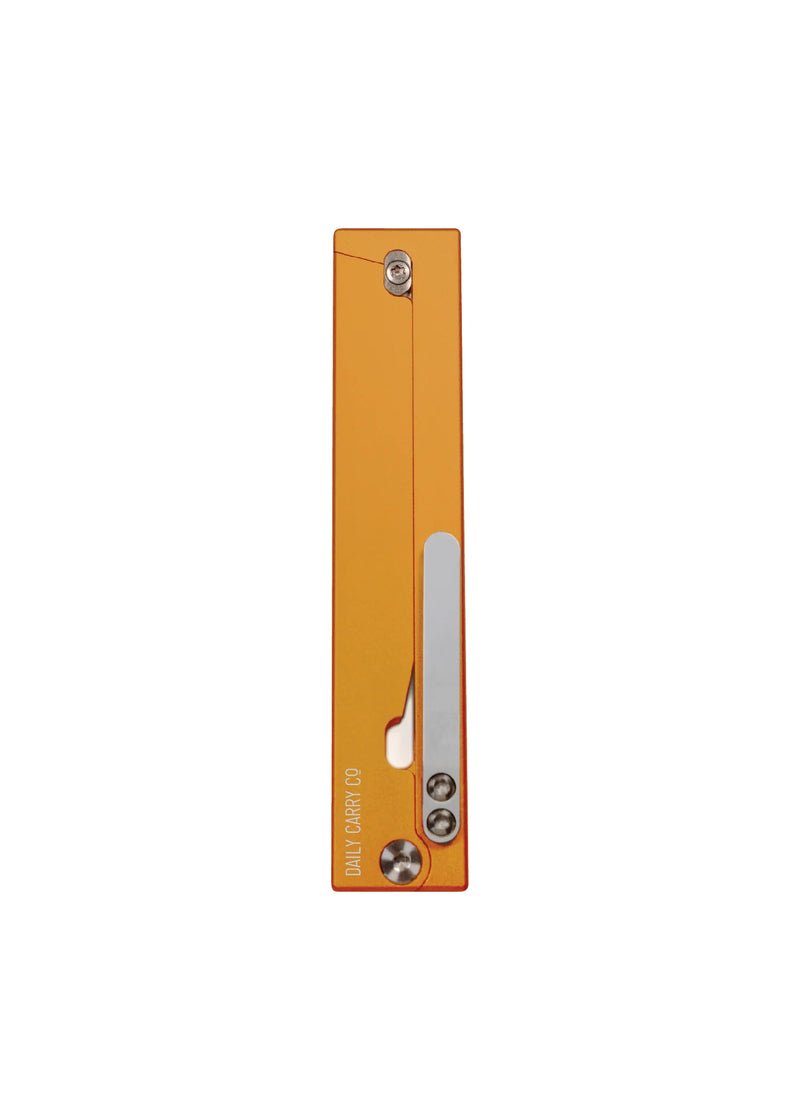 A closed pocket knife in an orange rectangular handle on a white background