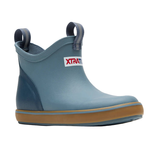 Blue rain boot with brown sole on a white background