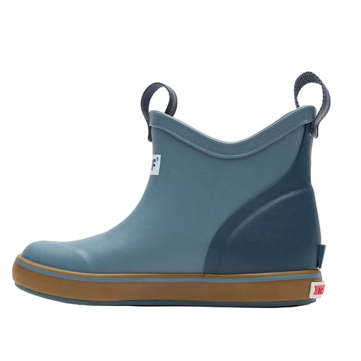 Blue rain boot with brown sole on a white background